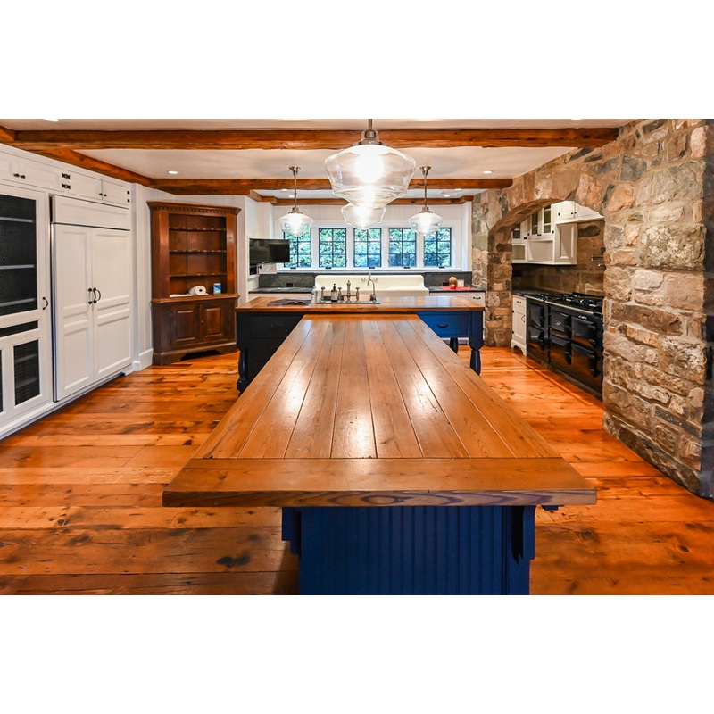 Rustic Traditional White & Navy Kitchen with Black AGA Range, Wood Top Island & Soapstone Countertops