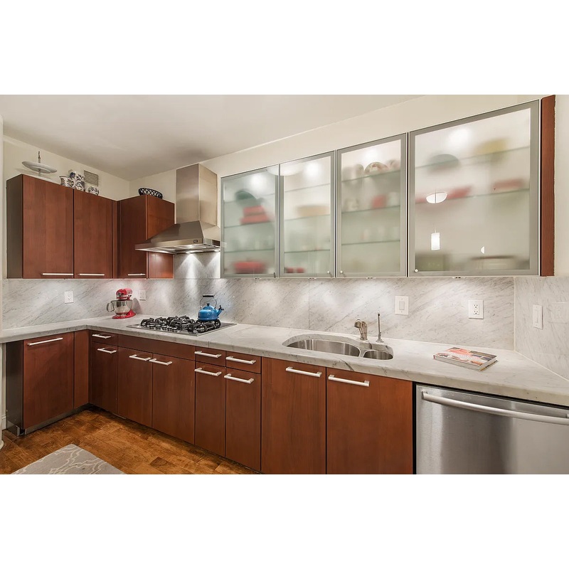 Poggenpohl Brown Toned Transitional Kitchen with Marble Countertops and Appliances
