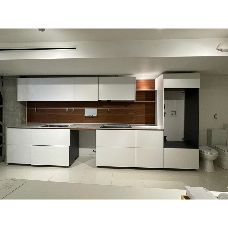 Valcucine Modern Glossy White Kitchen with Marble Countertops