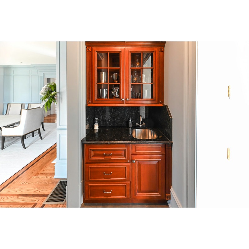 Wood-Mode Traditional Wet Bar with Dark Granite Countertops & Sub-Zero Wine Cooler