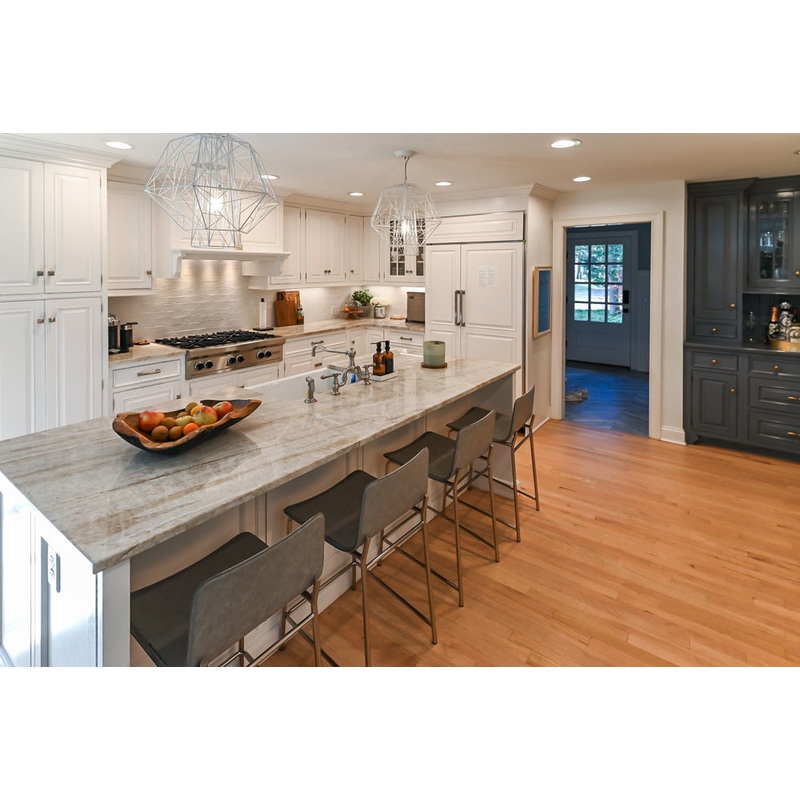 Traditional White Kitchen with Island, Appliances and Marble Countertops
