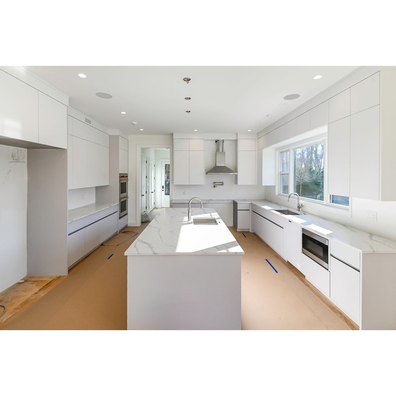 Large White Modern Kitchen with Island and Quartz Countertops