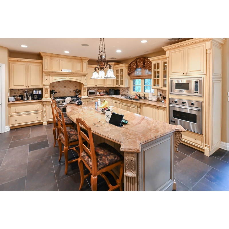 Custom Traditional Cream Kitchen with Island, Butler’s Pantry and Viking Appliances